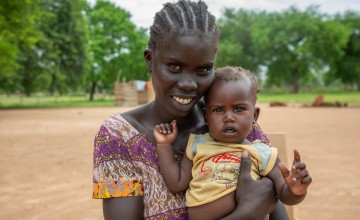 Adut with her daughter Axlam (nine months) at Lueth Ngor PHCU (Public Health Care Unit) in Aweil North. Photo: Eugene Ikua/Concern Worldwide
