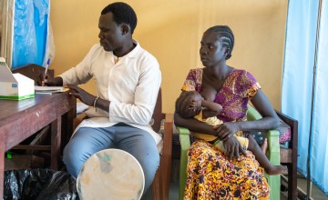 Adut with her daughter Axlam (nine months) at the Lueth Ngor PHCU (Public Health Care Unit) in Aweil North. Photo: Eugene Ikua/Concern Worldwide