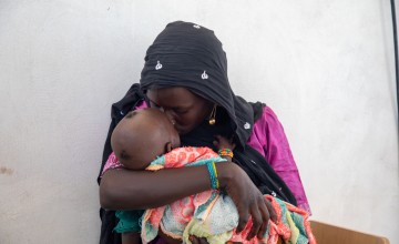 Fanta Kewbi (25) consoles her daughter Yakoura Ngay (8 months) at the Concern health post in Baga Sola, Western Chad. Photo: Eugene Ikua/Concern Worldwide