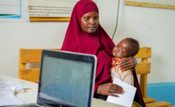 Ayan* (26) is a mother of five children from the outskirts of Baidoa, now living in a displacement camp in Daynile District, Mogadishu. She attends the Concern-supported Siinkadheer Health Facility with her youngest. Photo: Adnan Mohamed/Concern Worldwide