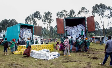 Concern staff members organise the distribution of food kits. Photo: Samuel Isenge/Concern Worldwide