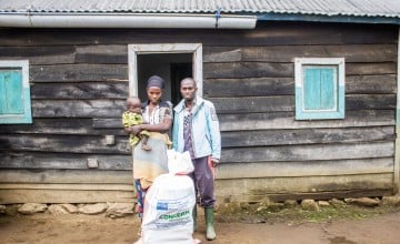 Ancila Niyonzima with her husband Rafiki Dukuze and their son Israel, who received free treatment for acute malnutrition and a hygiene kit from Concern under the EU-funded ECHO Masisi programme. Photo: Samuel Isenge/Concern Worldwide