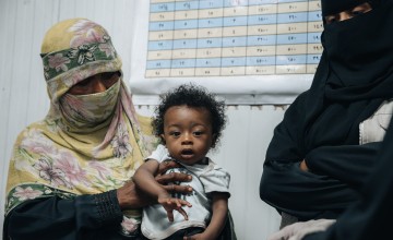 Basam* receiving a follow-up check-up 