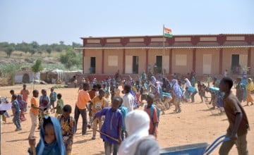 Students in Tillabéry help clean up their schoolyard with supplies provided by Concern Worldwide as part of the Learning Together programme. Photo: Concern Worldwide