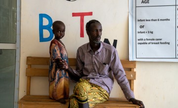 Raheem* (43) is married and a father of eight children. His youngest child, Faduma* (3) became severely ill, with a high fever and worsening weakness. After failed treatments at local clinics and the effects of the drought leaving them without milk to feed her, Raheem decided to seek help at Banadir Hospital, where she was diagnosed with malnutrition. Photo: Eugene Ikua/Concern Worldwide