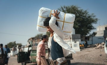 The Concern team distributing shelter materials to people affected by the sandstorm that struck Al Anad IDP Camp, Tuban District, Yemen.