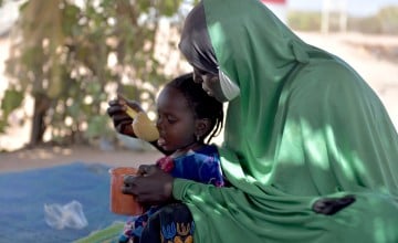 A child eating porridge made from fortified flour, Ouallam displacement site, Niger. Photo: Ali Abdoulaye/Concern Worldwide