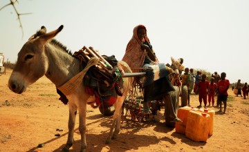 Binta Feriahmed (35), drawing water in Dollo Bay Wordea, in the Somali region of Ethiopia. The October to December rainy season was exceptionally poor in the Horn of Africa, with some areas receiving less than 30 percent of average rainfall.  