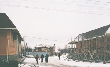 Locals walk through Okthyrka, a city in Ukraine's Sumy oblast that sits on the frontlines of conflict. Photo: Olivia Marlowe/Concern Worldwide