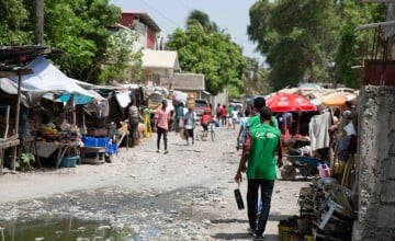 Concern team members on the streets of Cité Soleil in Port-au-Prince, Haiti. Photo: Kieran McConville/Concern Worldwide.