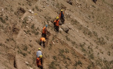 Community members in flood-prone areas in Afghanistan's Badakhshan province, have started to construct watersheds and canals as part of the inclusive livelihood project Faragir. The watershed irrigates the surrounding dry areas through a newly-created water supply and protects villages against potential floods. Photo: Marissa Droste/Concern Worldwide