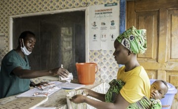 Marie* (28) visits the Buguri Health Centre to collect nutritional supplements for her daughter, who has been receiving treatment for acute malnutrition for the past two months. (Photo: Concern Worldwide)