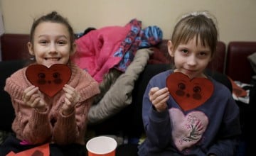 Natalia* (8) and Sofia* (7) attend a children's PSS play therapy session in Kharkiv. Photo: Jon Hozier-Byrne/Concern Worldwide