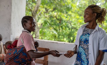 Bernadette receives therapeutic food from health clinic for her son David