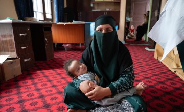 Malalai*(30) visits the Concern health clinic with her son, Yaser (1)