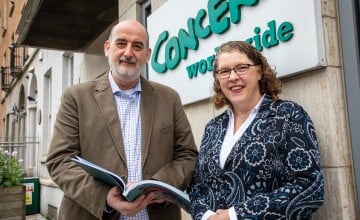 Concern Worldwide Chief Executive Officer Dominic Crowley and Chair Rosalyn Tamming with the 2025 Annual Report. Photo: Jon Hozier-Byrne/Concern Worldwide