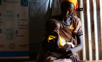Nyacanya Chatiem with her grandchild Liakuoth at a Concern-supported clinic in Unity State, South Sudan. Photo: Eugene Ikua/Concern Worldwide