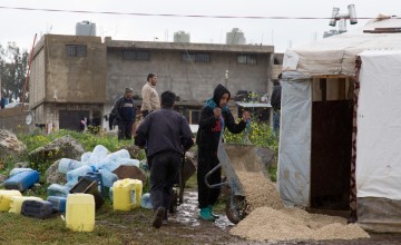 Building materials provided by Concern Worldwide help Syrian refugees in northern Lebanon to prepare their shelters for winter. Photo: Dalia Khamissy / Concern Worldwide.