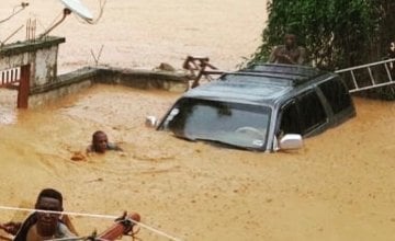 People trapped in heavy floods in Freetown, Sierra Leone in August 2017.