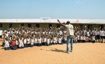 Concern WASH project manager speaks to a school in Mande about good hygiene practices. Photo: Concern Worldwide.