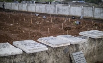 Kingtom cemetery in Freetown was the main cemetery used for burials during the height of the Ebola crisis, with up to 80 burials a day. Concern Worldwide manages the cemetery and has been working to erect permanent grave markers on many of the plots. Photo taken by Kieran McConville / Concern Worldwide.