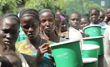 Nyakim Wiyual, Nyachuol Ruot, Nyamal Deng are amongst those attending a food distribution at one of Concern's nutrition centre's in Pugnido Camp 1, Gambella, Ethiopia. Photo: Jennifer Nolan / Concern Worldwide 