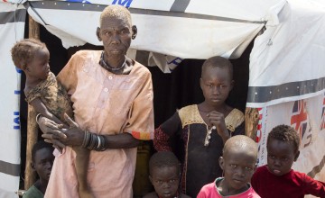 Puru Wani and 14 of her extended family fled their village on the outskirts of Juba when fighting broke out in July. Now they are staying in two small shelters at a protection of civilians site beside the UN base in Juba. &quot;Our village is destroyed. Everything was looted - there is nothing to go back to,&quot; she says, &quot;and If we did go back we would be killed.&quot;