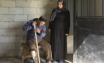 Omar* was a farmer in Syria before he lost his leg to a mine on his land. He now lives in a shelter with his wife Fatimah who is pregnant and their children. The shelter has been rehabilitated by the Concern team in northern Lebanon. Photo: Chantale Fahmi/Concern Worldwide 2017