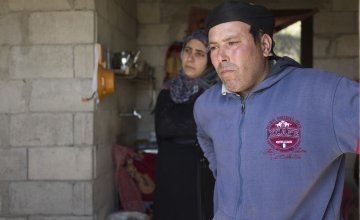 Omar* and his wife Fatimah*, who fled Syria as a result of the conflict, speak about their journey to a Concern rehabilitated shelter in northern Lebanon. Photo: Chantale Fahmi/Concern Worldwide 2017.