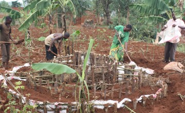 Odette Kanziza, along with family members, prepares her kitchen garden which was constructed with thanks to a generous $100 (€95) public donation. Photo: Concern Worldwide.