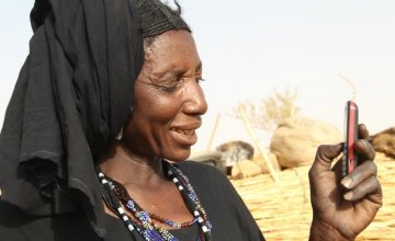 Gaichatou uses her mobile phone as part of the Concern cash transfer program in Niger. Photo taken by Tagaza Djibo/Concern Worldwide.