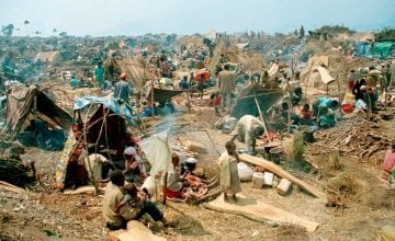 Rwandan refugees gather on the roadside near Goma, having just crossed the border into Zaire in 1994. Photo: Concern Worldwide.