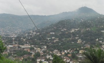 This photo taken in 2014 shows the scale of housing development around the hills of Freetown, Sierra Leone. Photo by Kai Matturi, Concern Worldwide. 