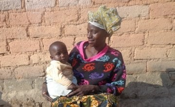 Thecla Abdul Lugenge with her youngest child Asha in Mfriga village, Mfriga ward, Njombe district, Irigna region. Photo: Mushengezi/Concern Worldwide.