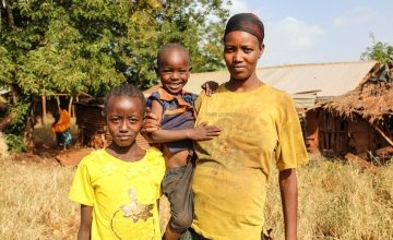 Nasino Asuran (20) is six months pregnant with her third child. Pictured here with her daughter Nangiro and son Sampson, the family are malnourished and have not eaten all day. They normally eat boiled maize once a day. Leyai Village, Marsabit, Kenya. Photo: Jennifer Nolan / Concern Worldwide, Feb 2017.