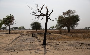 All that remains of Nile Hope’s compound that was burnt to the ground during a raid by soldiers in a Leer County village last year. South Sudan, March 2017. Photo: Kieran McConville, Concern Worldwide