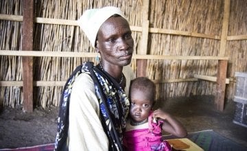 Nyalam Lleu and her one-year-old daughter, Nyatima Gathuoth, visit the Concern Worldwide nutrition center in Bentiu. Photo: Concern Worldwide.