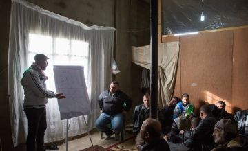 A session on violence to Syrian refugee men in northern Lebanon. 