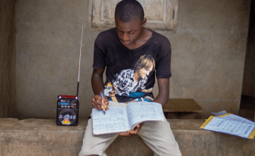 : Schools have been closed due to the Ebola outbreak leaving children like  Mada Karimu reliant on radio based education. Photo: Concern Worldwide