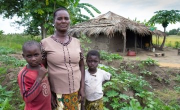 Albertina (pictured here with her grandchildren) is taking part in a farmer field school run by Concern. Photo taken by Crystal Wells.