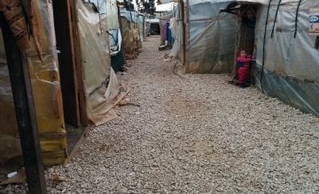 Inside an informal tented settlement supported by Concern in Lebanon. Photo: Kevin Jenkinson/Concern Worldwide. 