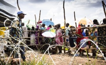Internally displaced people queuing at a Protection of Civilian camp near Juba, South Sudan. 