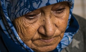 Iman* lost most of her family, including her husband, in a bombing attack on their home in Syria. She lives in a garage in Akkar province, Lebanon, which has been weatherproofed and plumbed by Concern Worldwide. Photograph taken by Kieran McConville/Concern Worldwide.