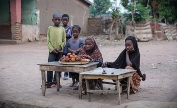 Children set up a stall to sell their wares to early morning passers-by in the town of Kouango, Central African Republic. Photo: Kieran McConville