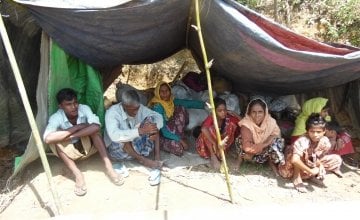 Rohingya refugees arriving to Cox’s Bazar after a ten day walk from Myanmar. They are sheltering under a makeshift structure requiring food, water shelter and healthcare. Photo: Bijoy Krishna Nath/Concern Worldwide.