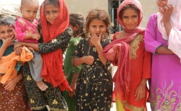 Beneficiaries of Concern's shelter project in the village of Bilal Dal, Punjab, Pakistan, 2011. Photo: Concern Worldwide.