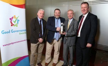 Jim Hynes, Richard Dixon and Tom Shipsey from Concern accepting a special recognition award from Diarmuid O'Corrbui, CEO of the Carmichael Centre. Photo: Marc O'Sullivan/Concern Worldwide.