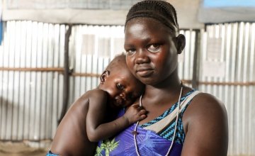 Nyakoun with her son, one year old Thujin. Thujin is being assessed for malnutrition at a nutrition centre in Gambella. Photo Jennifer Nolan/ Concern Worldwide, Ethiopia.