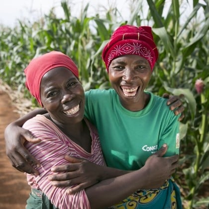 Esime Jenaia, a Lead Farmer for conservation Agriculture, at her plot in Chituke village, Mangochi, Malawi, with neighbour Esnart Kasimu. Photo: Kieran McConville / Concern Worldwide.