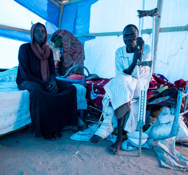 Alafia sits with is wife Hava